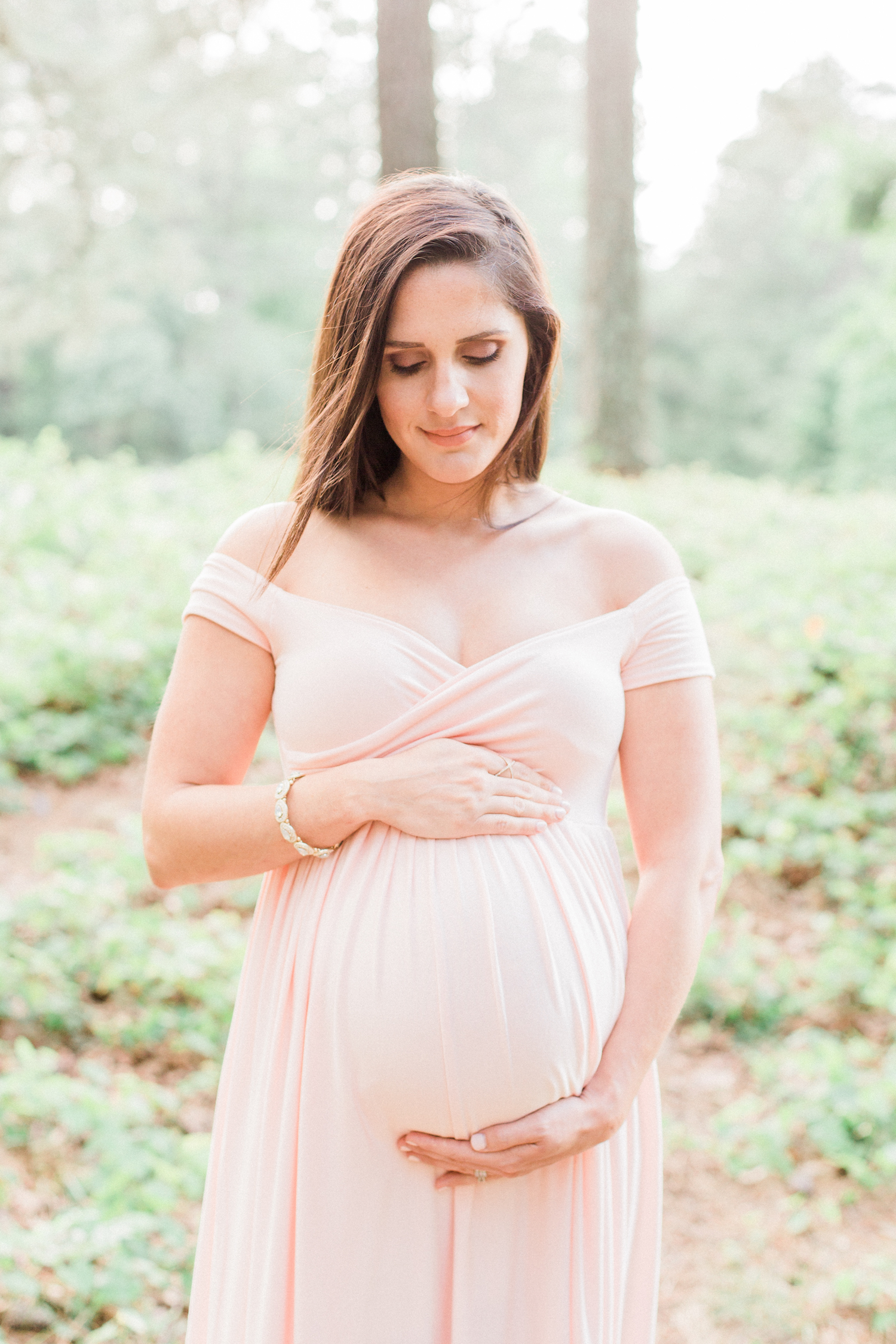 Maternity portrait. Blush maternity dress, pink family session outfit.