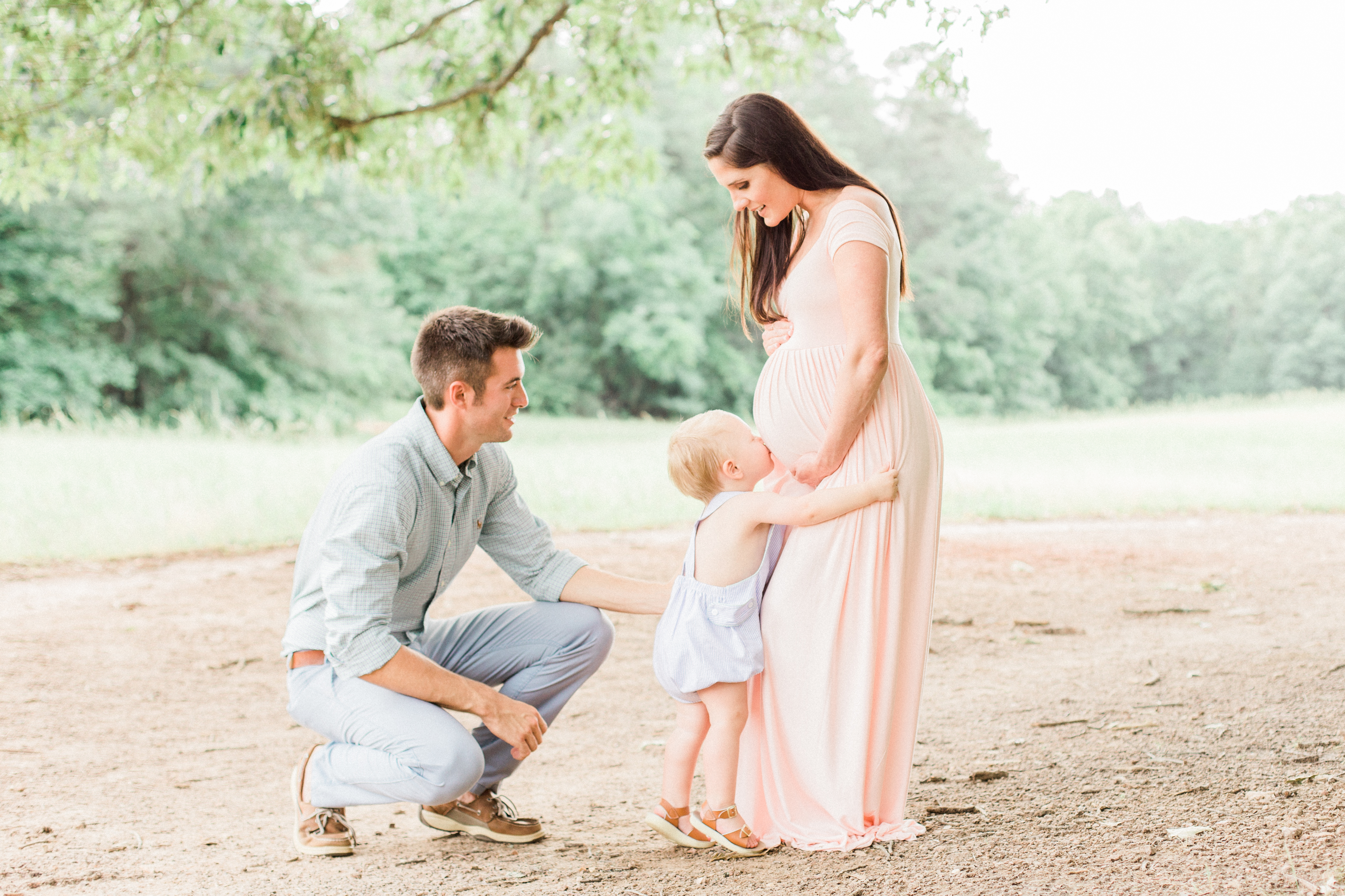 Spring time family session with pastel outfits- blush pink maternity dress. 